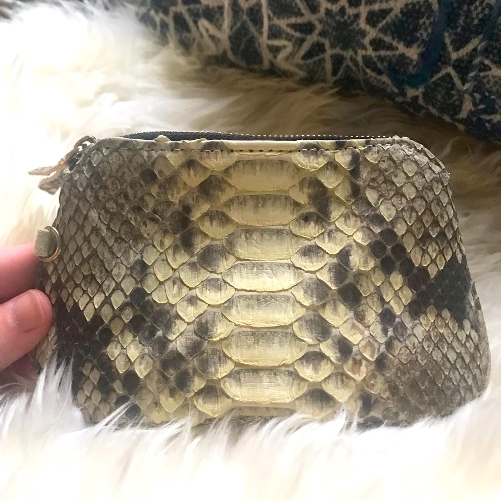 Genuine Python Pouch. Brand new. Genuine suede lining.